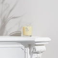 Organic Aromatherapy Candle - Uplifting candle on white ledge