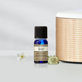 Neals Yard Remedies Rose Absolute Organic Essential Oil Front Product Shot Beside a diffuser!