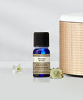 Neals Yard Remedies Rose Absolute Organic Essential Oil Front Product Shot Beside a diffuser!
