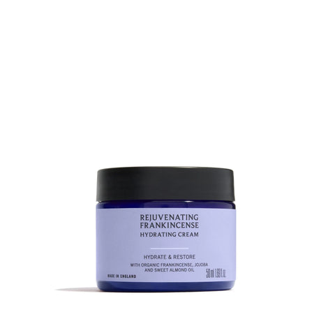 Jar of rejuvenating frankincense hydrating cream on a white background