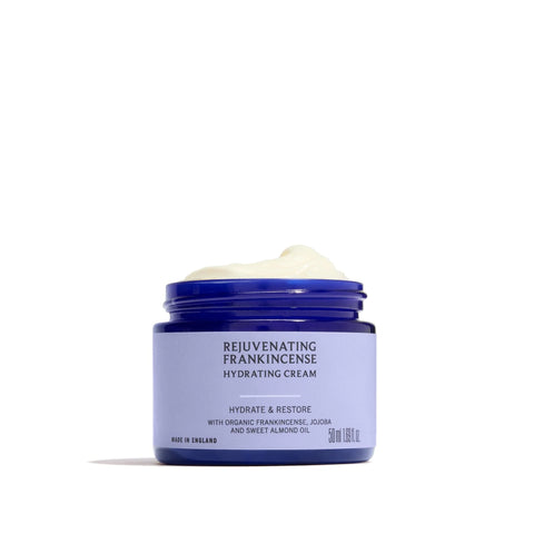Jar of rejuvenating frankincense hydrating cream on a white background