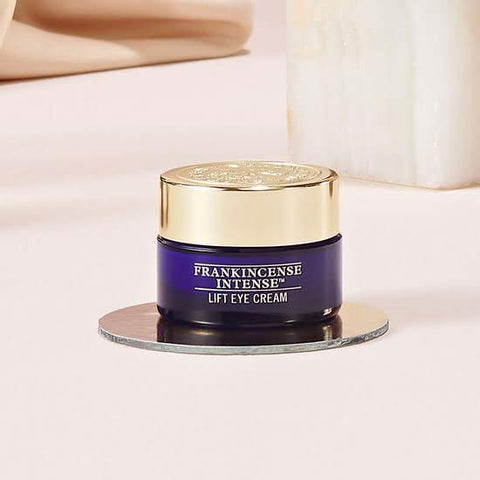Frankincense Intense™ Lift Eye Cream with background
