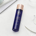 NEW Frankincense Intense™ Hydrating Essence with background