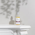 Organic Aromatherapy Room Spray - Calming spray bottle on white ledge