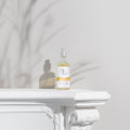 Organic Aromatherapy Room Spray - Uplifting bottle on ledge