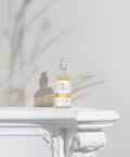 Organic Aromatherapy Room Spray - Uplifting bottle on ledge