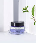 Reviving White Tea Face Mask container with leafy background